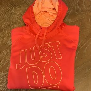Nike women pink hoodie with orange size large pockets